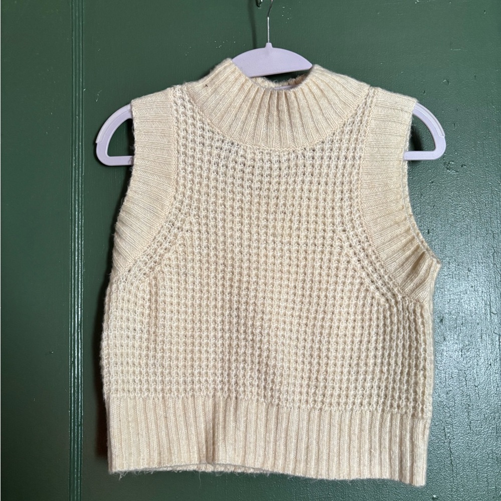 Cream color sweater vest
